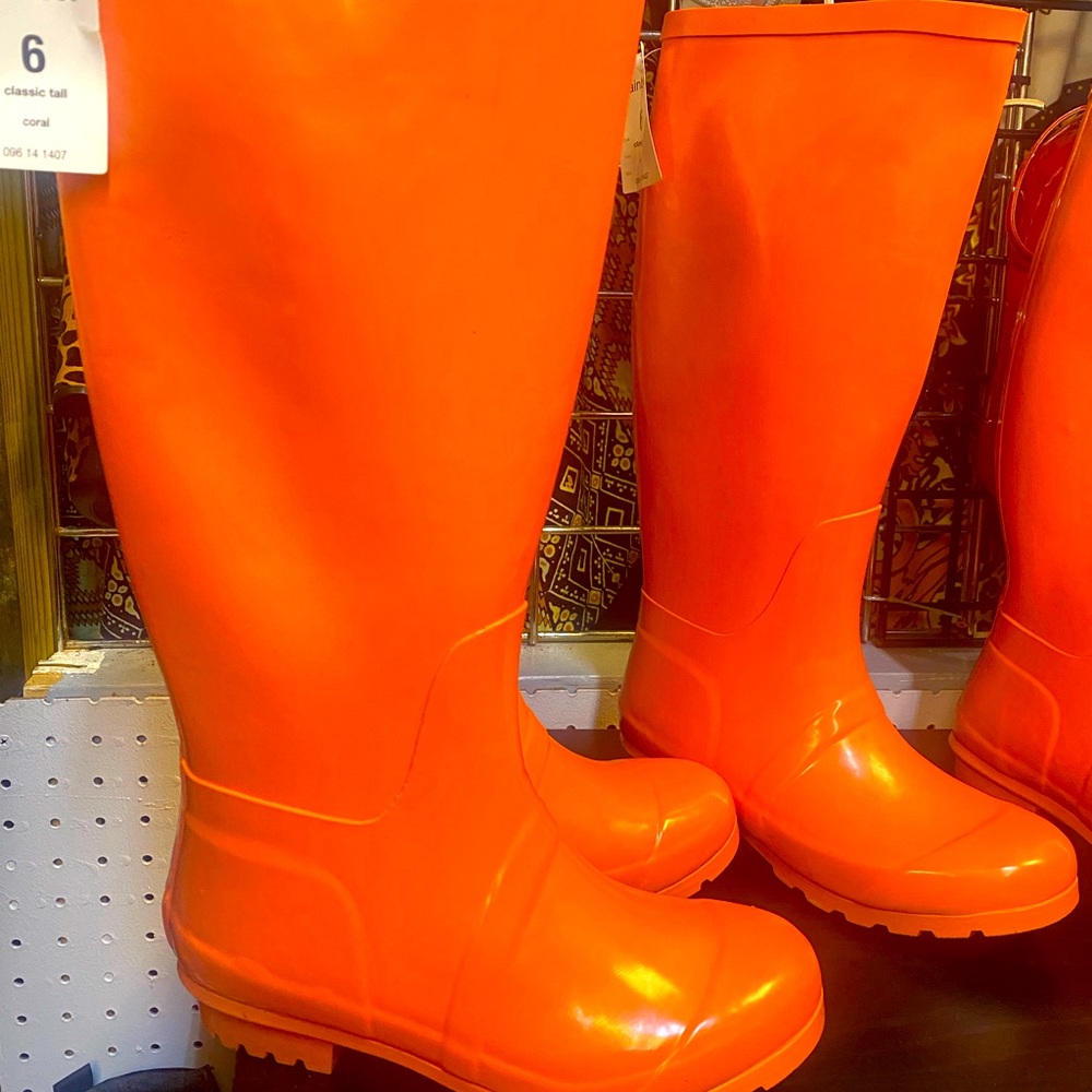 New rain boots it’s bye and blue one size 6 limited quantity available.